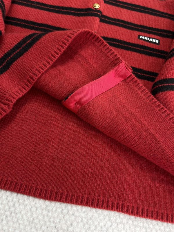 Red striped cardigan